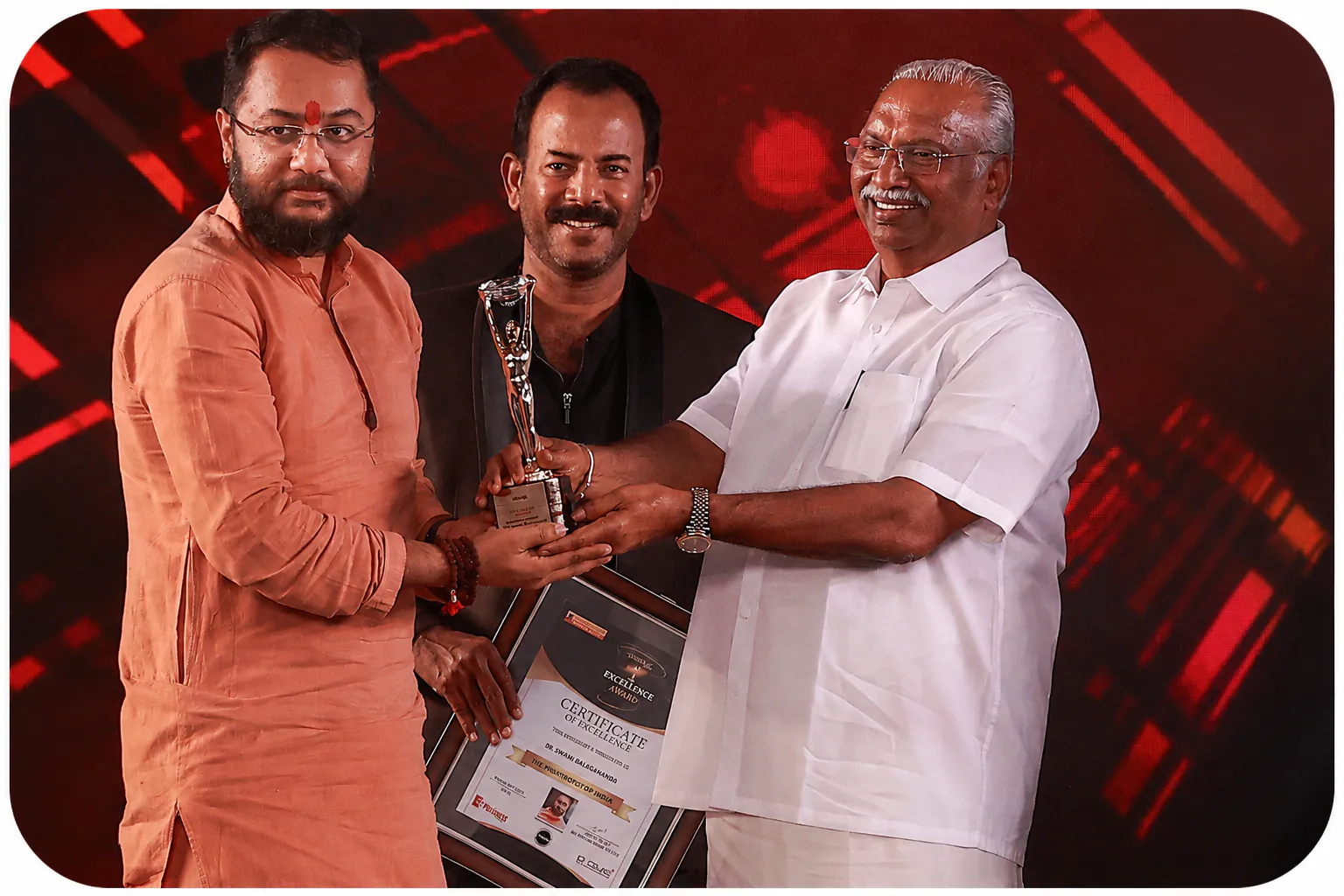 Swami Bhadraanand receiving an award on stage