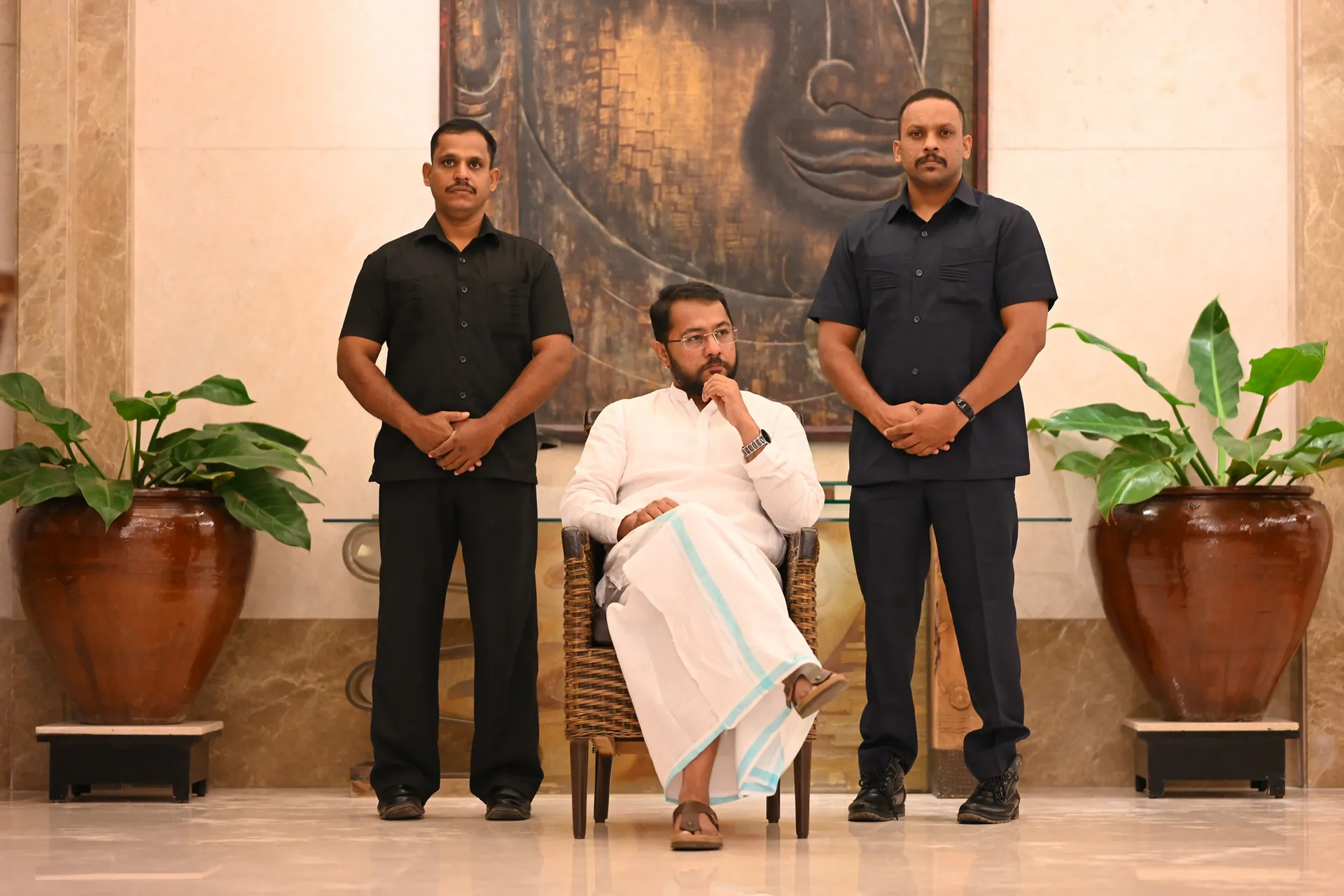 Swami Bhadraanand seated at a public event