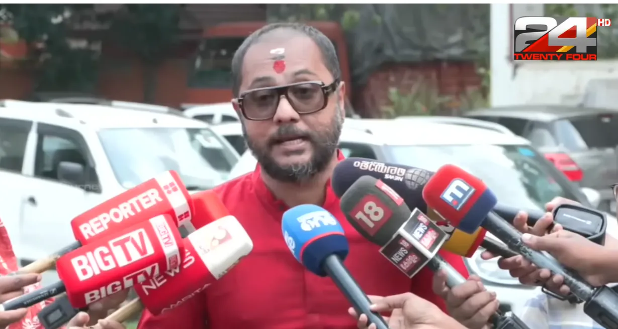 Swami Bhadraanand speaking to reporters from 24 News and other channels
