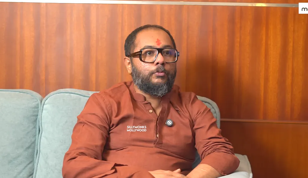 Swami Bhadraanand in an orange kurta during a sit-down interview