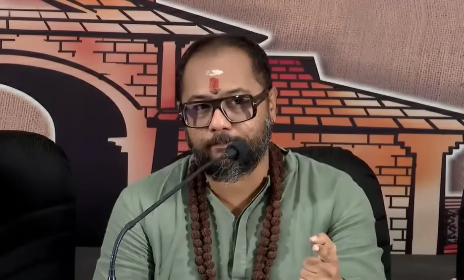 Swami Himaval Bhadrananda answering questions live on Reporter TV